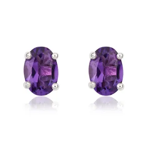 9ct White Gold Amethyst 7x5mm Oval Claw Set Stud Earrings