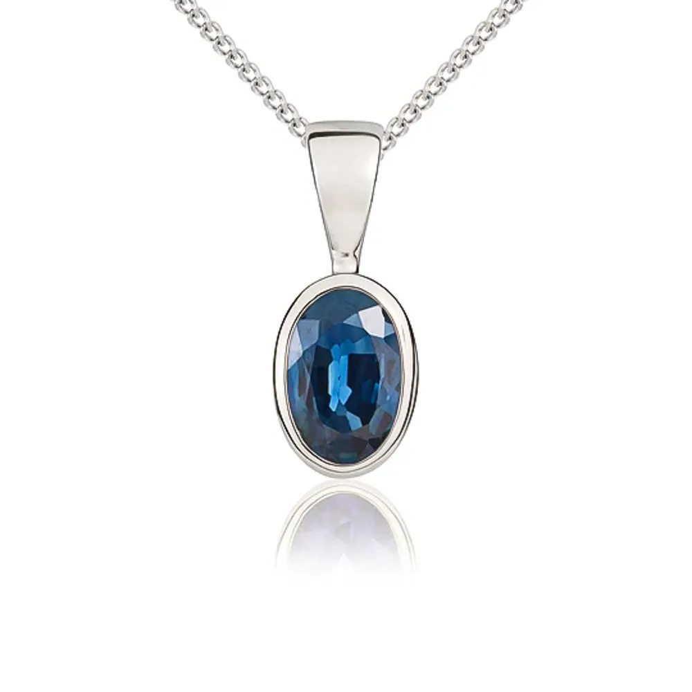 9ct White Gold Sapphire 6x4mm Oval Rub Over Set Pendant