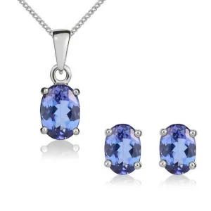 9ct White Gold Tanzanite 7x5mm Oval Claw Set Pendant and Stud Earrings Set