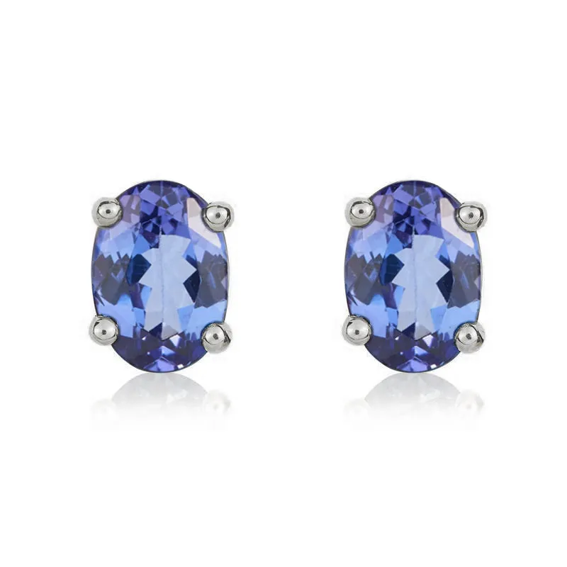 9ct White Gold Tanzanite 7x5mm Oval Claw Set Pendant and Stud Earrings Set