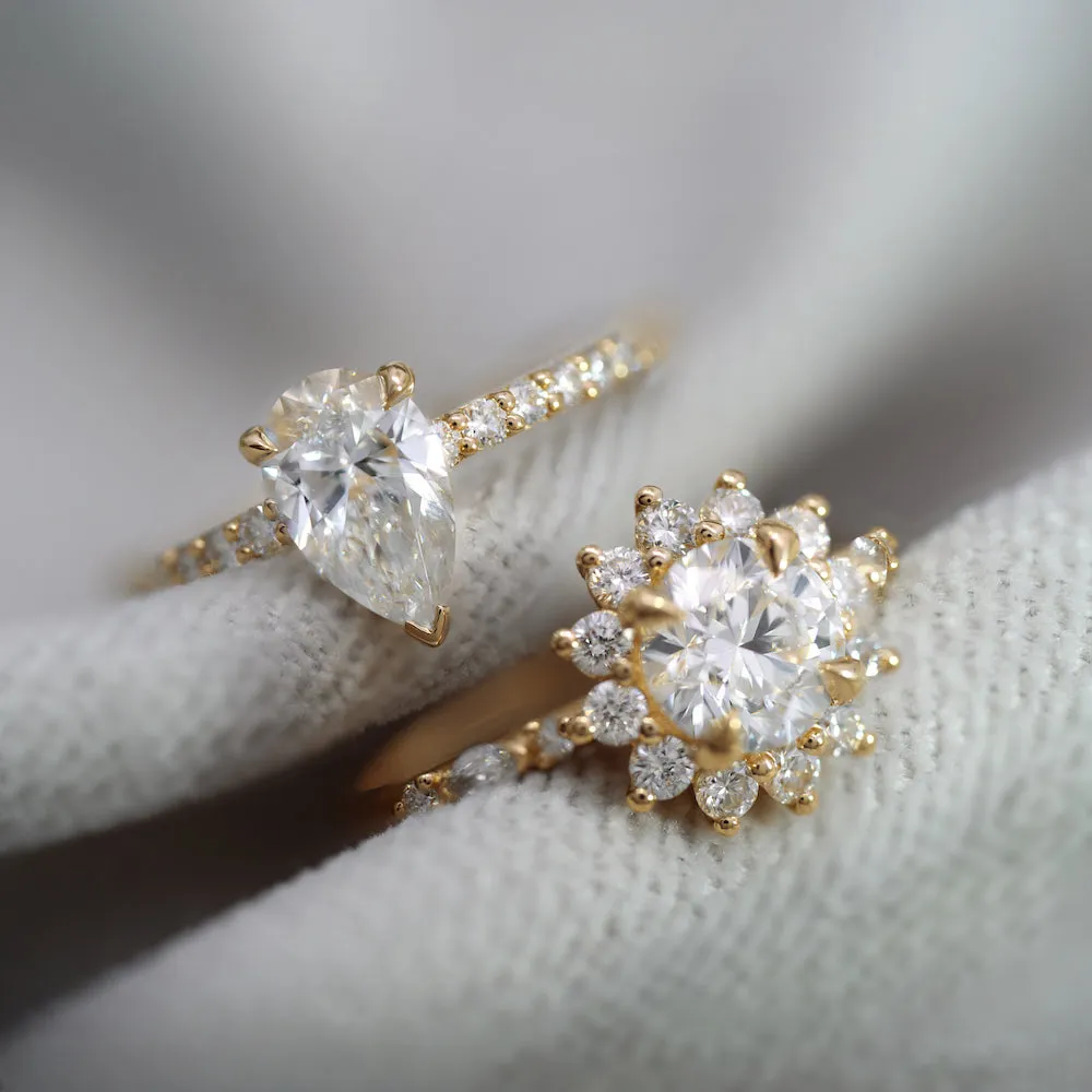 Pear Shaped Diamond Solitaire with Pave Shoulder