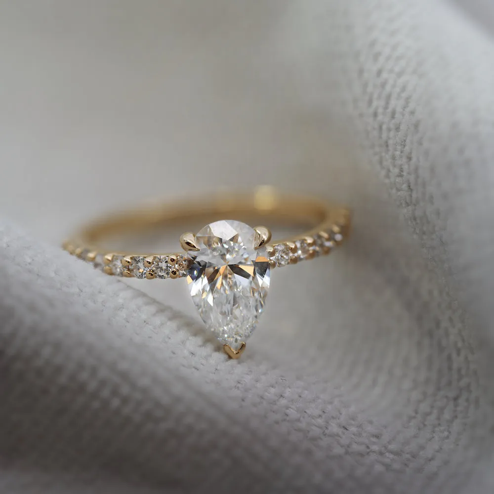 Pear Shaped Diamond Solitaire with Pave Shoulder
