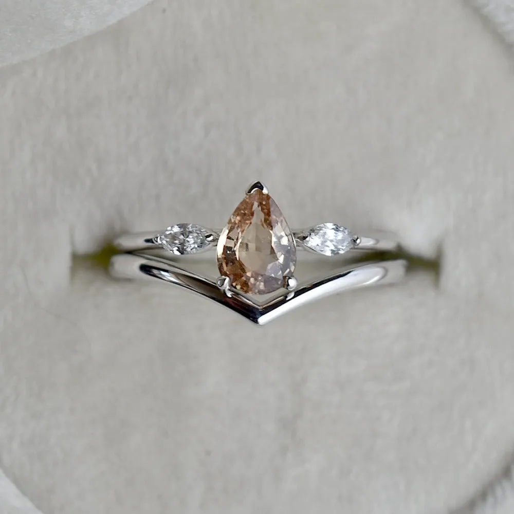 Pear-Shaped Peach Sapphire Engagement Ring with Diamond Accents