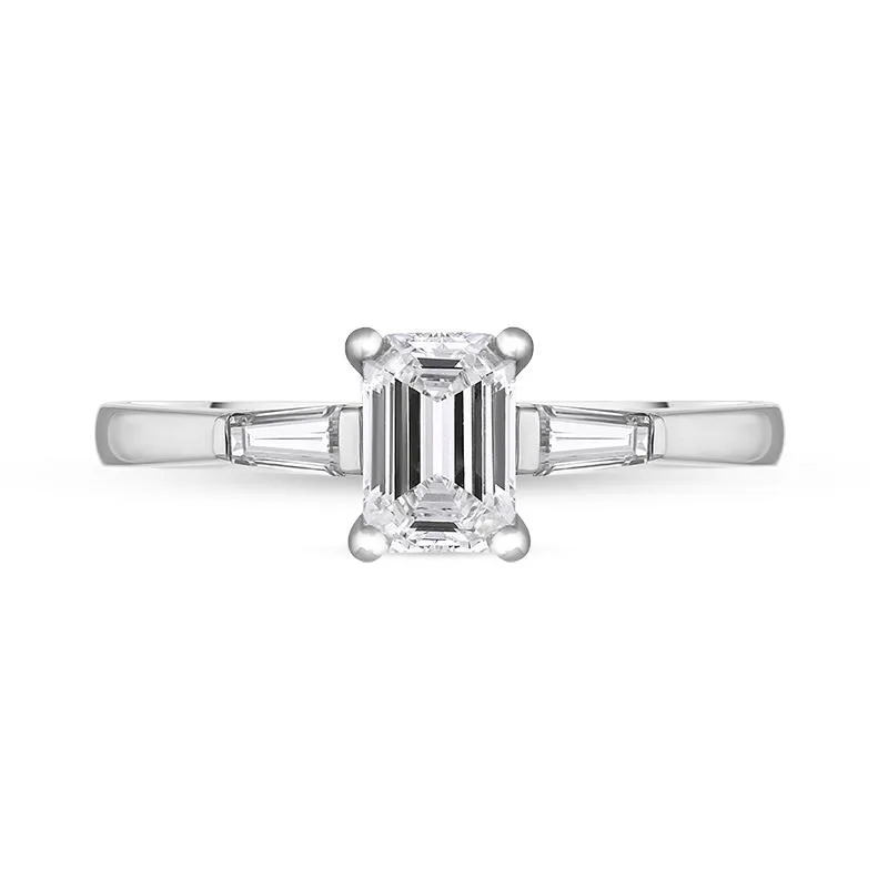 Platinum Diamond Emerald and Tapered Baguette Cut Three Stone Ring